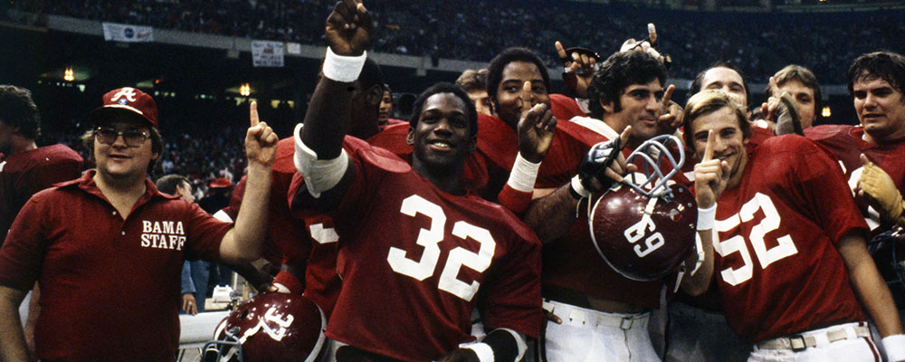 1979 Football Team on sideline after win