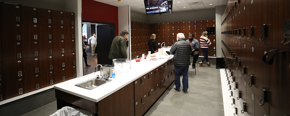 Locker room servicing the South Championship Club with a bar running the center of the room